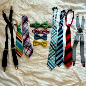 Lot of bow ties, ties, suspenders and belts for little boy